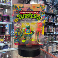 Mike The Sewer Surfer (Vintage TMNT Ninja Turtles, Playmates) SEALED